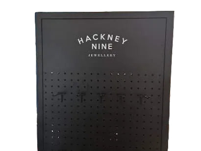 HACKNEY NINE Double-Sided Spinning Metal Floor Display Stand – Black Matte Luxe Pegboard With Logo