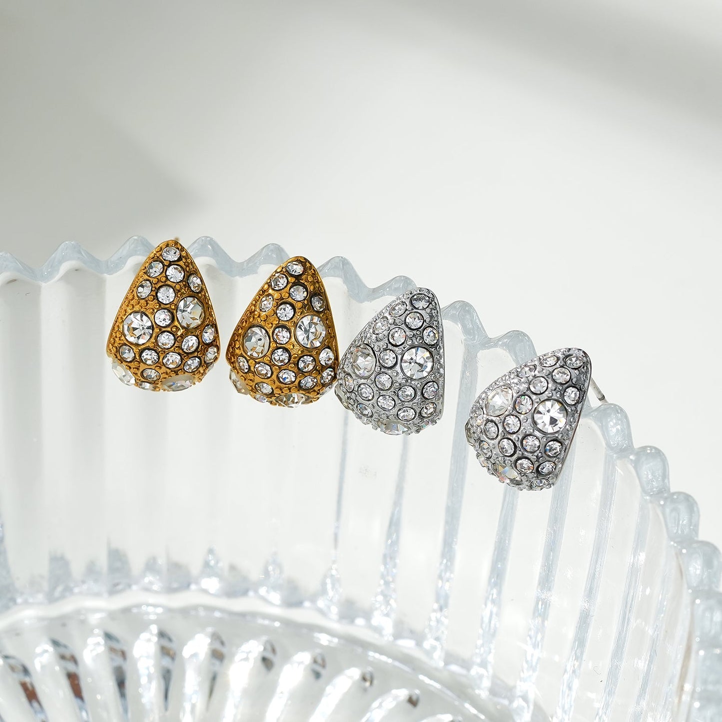 ADALAJ Gold & White Gold (Silver Toned): Pavé Zirconia Tear Drop Stud Earrings - Statement of Confidence