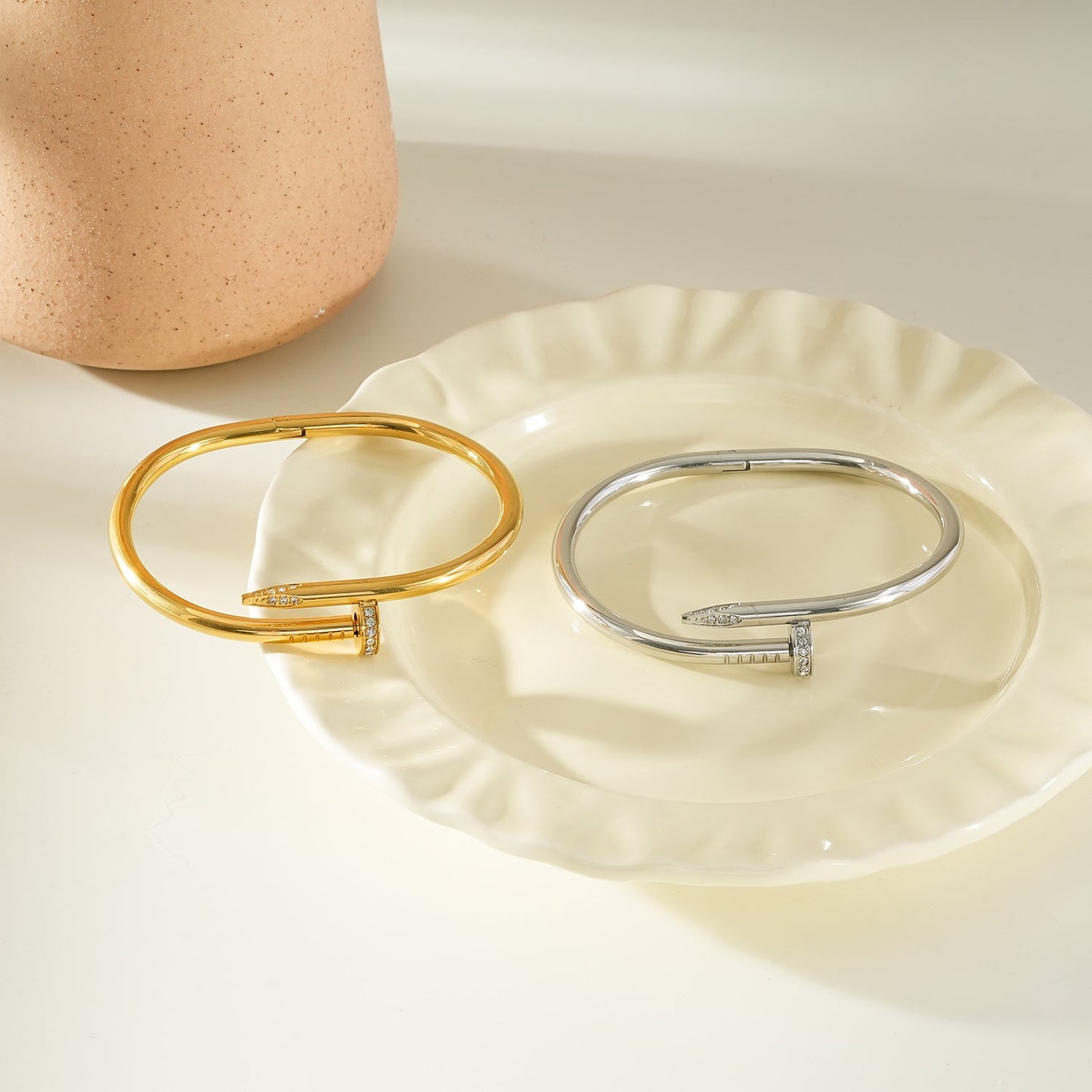 DAVIDKA Gold: Zirconia Embedded Industrial-Chic Twisted Nail Bracelet