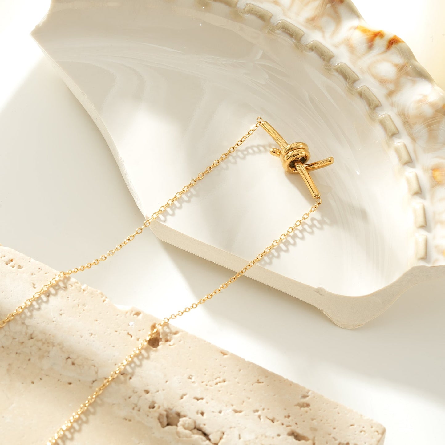 LARISA Gold: Bar Pendant Necklace with Knotted Symbol Detail