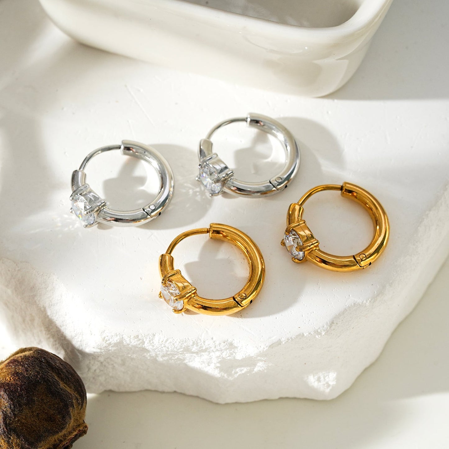 GALENA Gold: Mini Hoop Gold Earrings with a Rounded Moissanite Stone