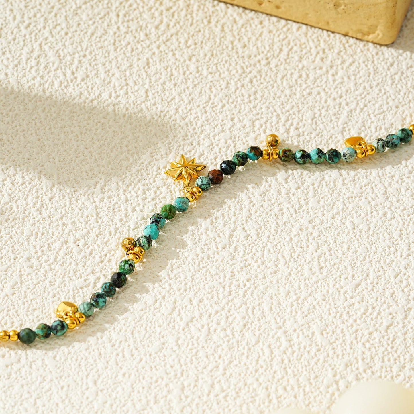 Style KAVYA LG 9861: Blue Turquoise Stones with Gold Beads & Charms Chain Anklet.