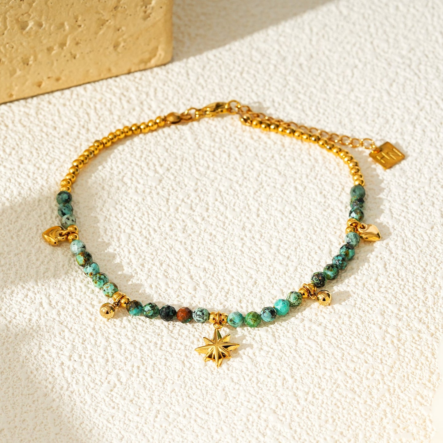 Style KAVYA LG 9861: Blue Turquoise Stones with Gold Beads & Charms Chain Anklet.