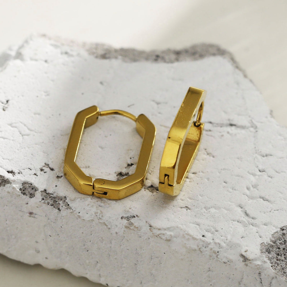 Style: CACCURI 122237 Geometric Shaped Contemporary Hoop Earrings.