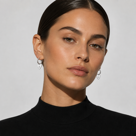 PYAR Silver (White Gold): Mini Hoop Earrings Anchoring a Heart Shaped Keylock Charm