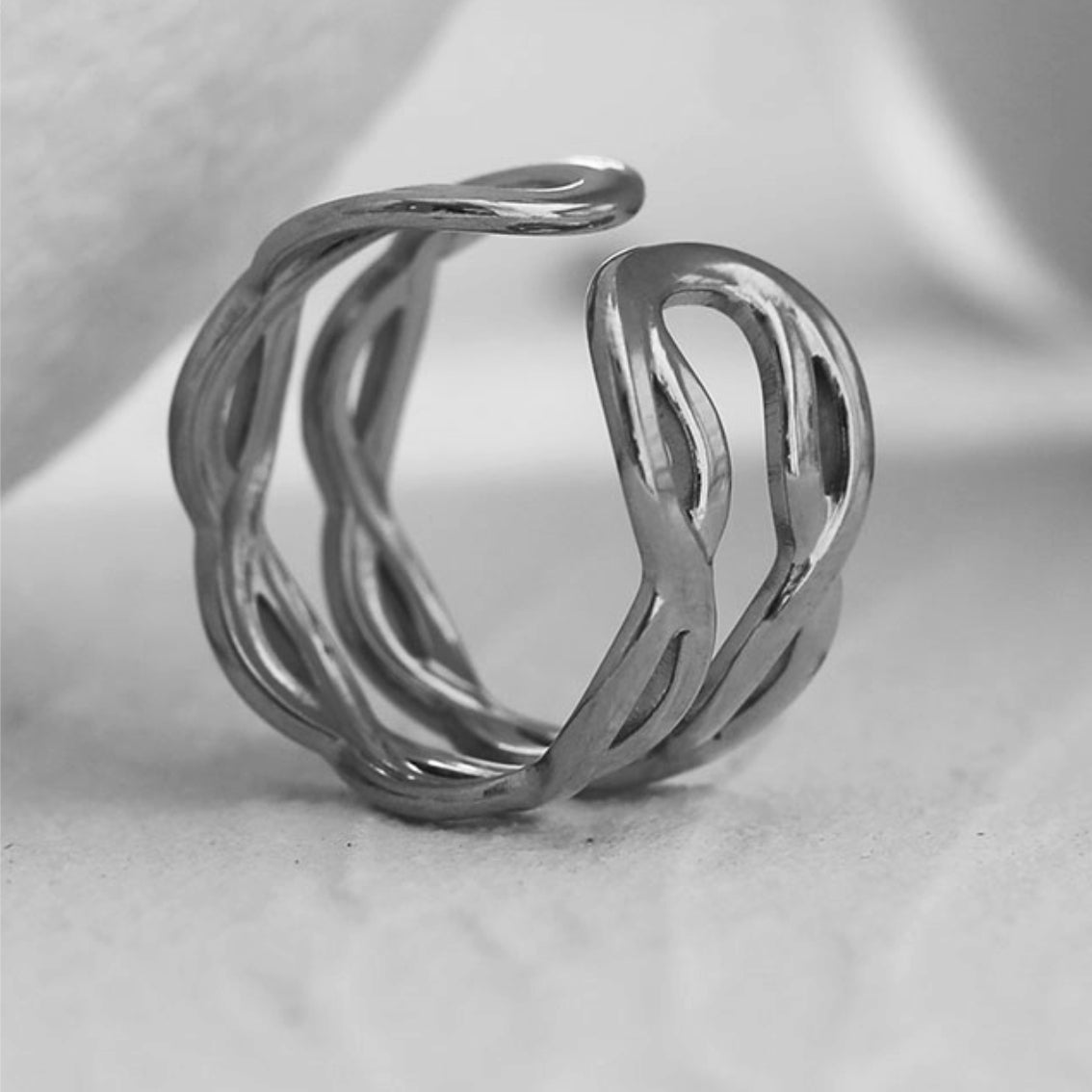 VENESSA Silver Toned White Gold: Intertwined Repeated Pattern Adjustable Ring
