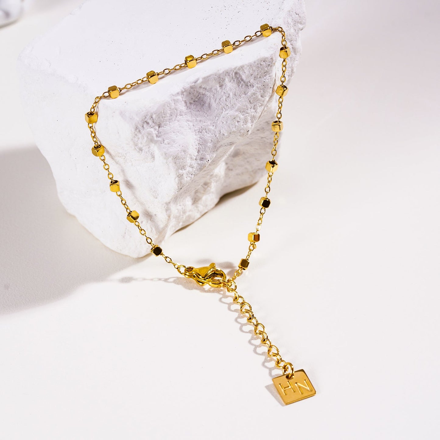 Style: DEMELZA: Essential Daily Bracelet with Delicate Square Beads.