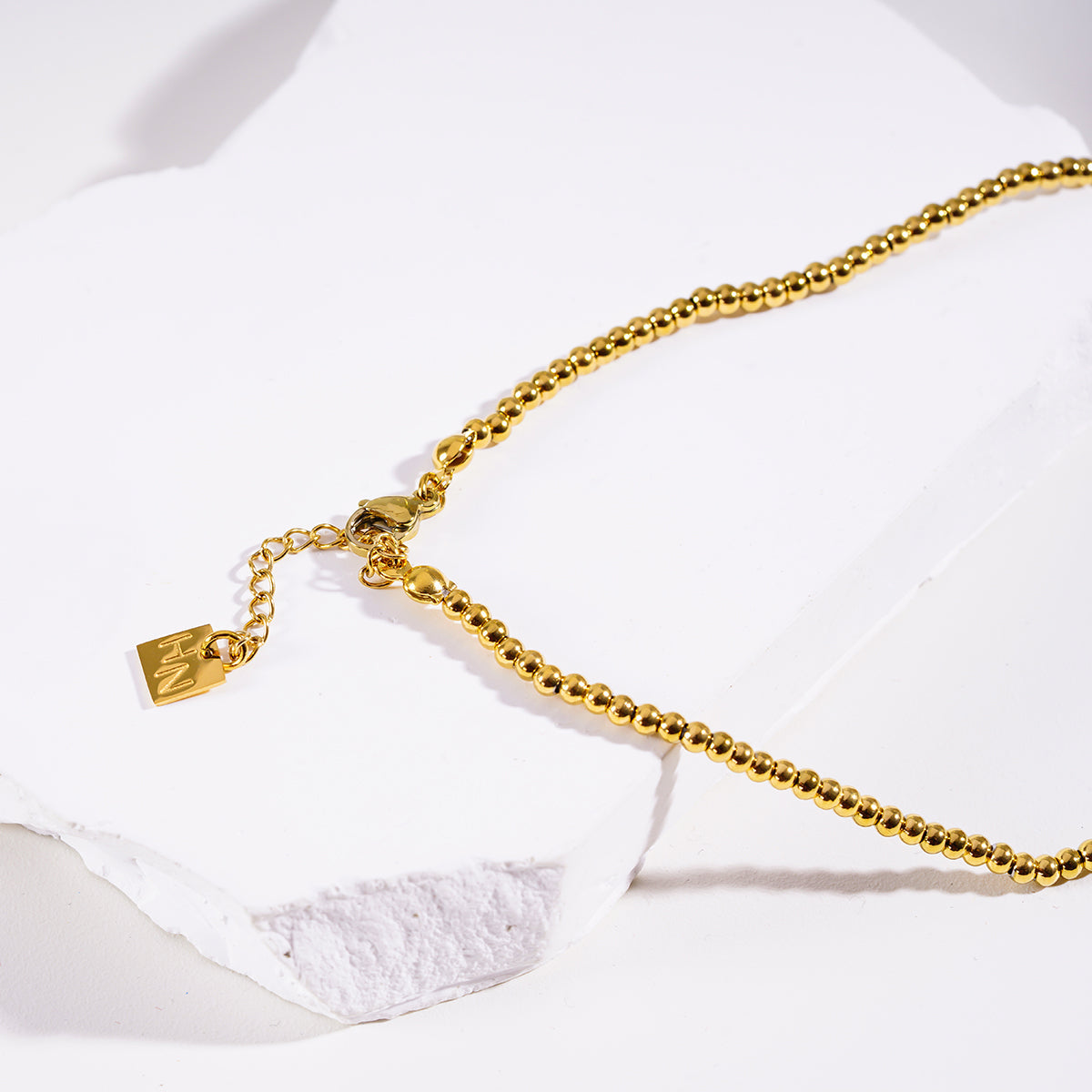 Style MILLIE 4469: Twin-Bead Fusion Gold Chain Necklace.