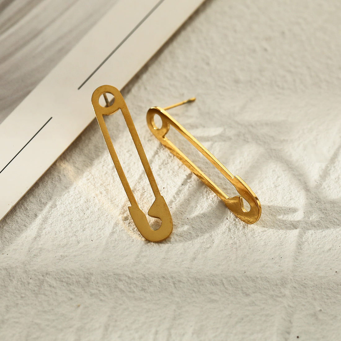 hackney nine | hackneynine | necklace | earrings | charms | jewelry | jewelry-store | pandora | bracelet | shop-jewelry | gold-jewelry | heart-Jewelry | Inspirational-jewelry | dainty-jewelry | zirconia | freshwater_pearls | safety_pin_earrings | puck_rock_style | safty_pin_jewelry