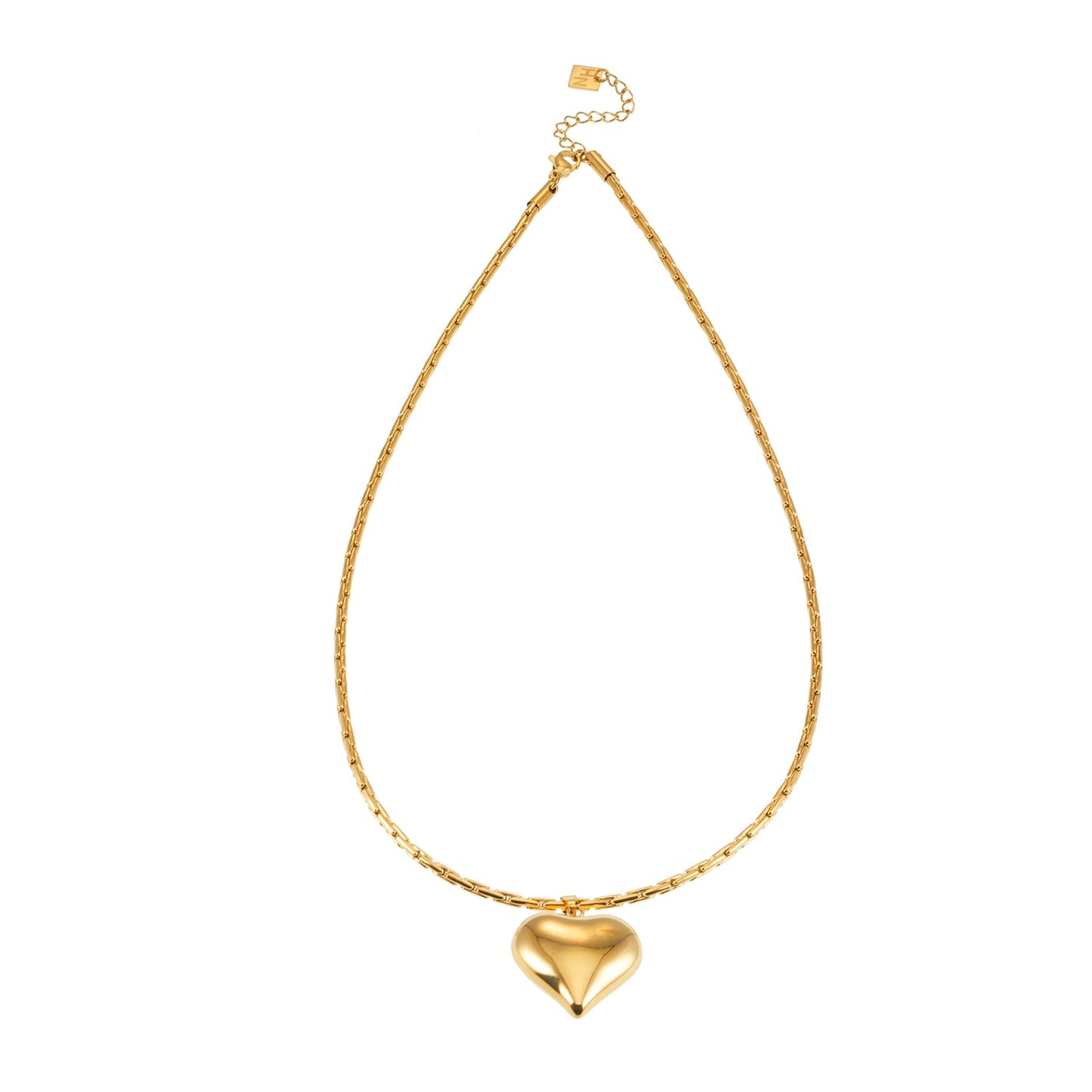 ABEL: Engineered Cable Chain with Puffy Heart Pendant in Gold.