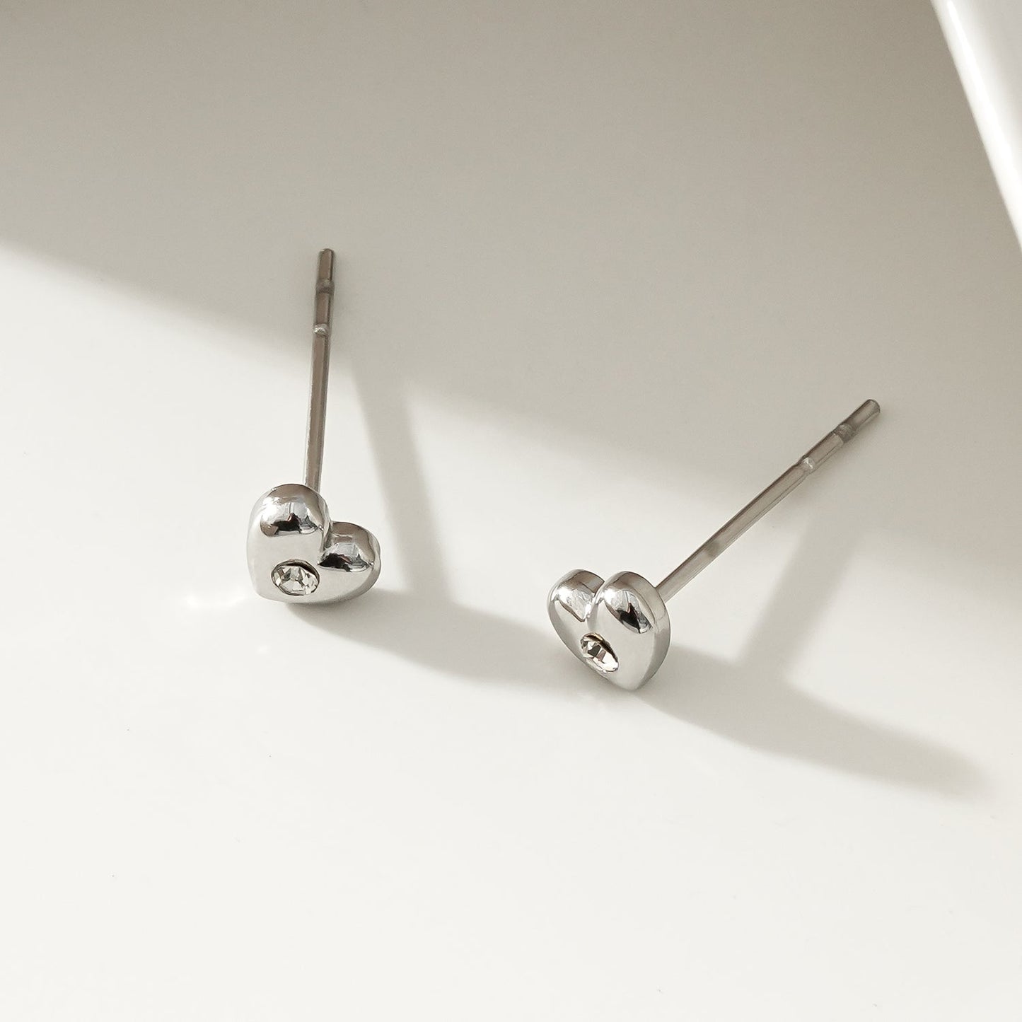 ADORE: Puffy Silver Heart Shaped Solitaire Zirconia Stud Earrings