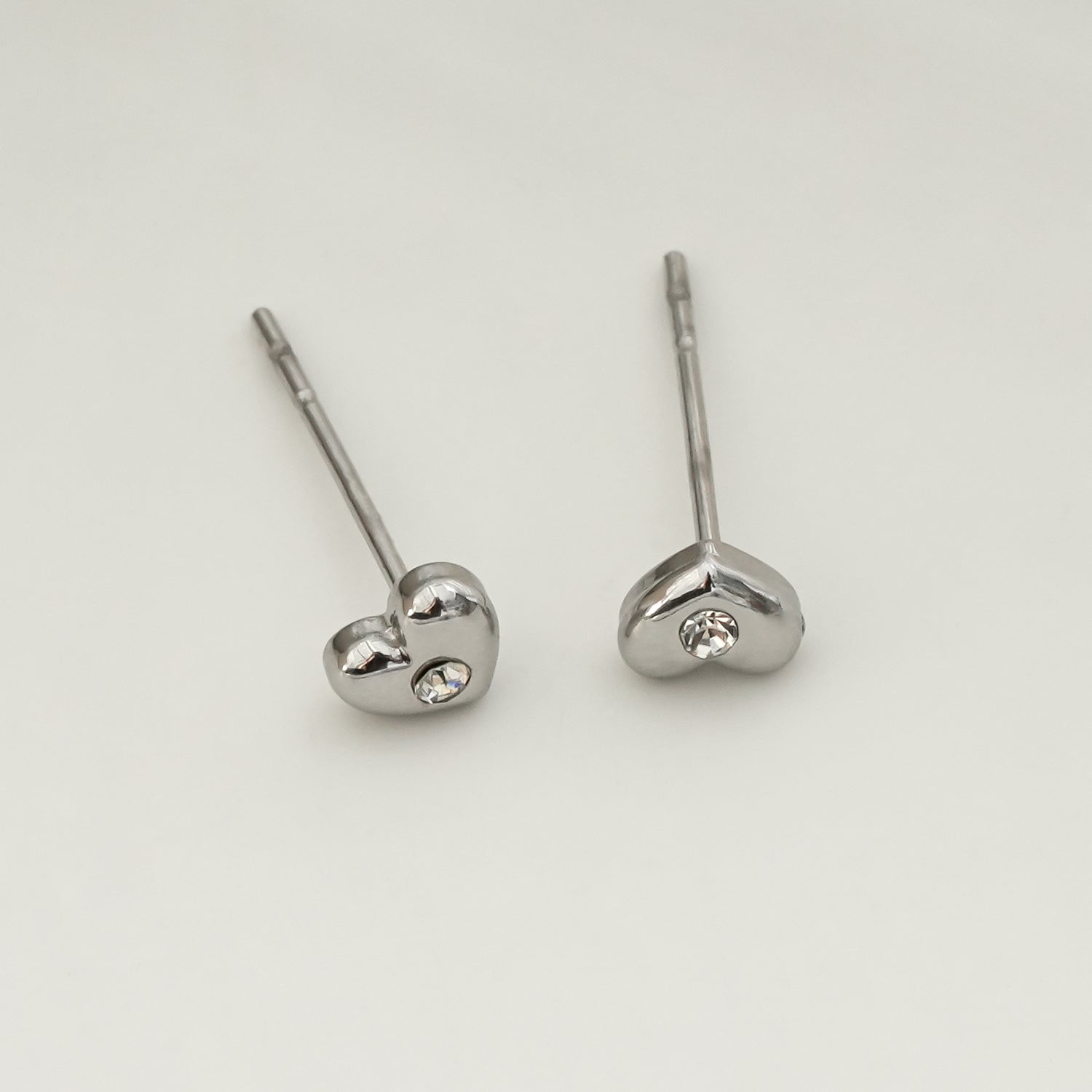 ADORE: Puffy Silver Heart Shaped Solitaire Zirconia Stud Earrings