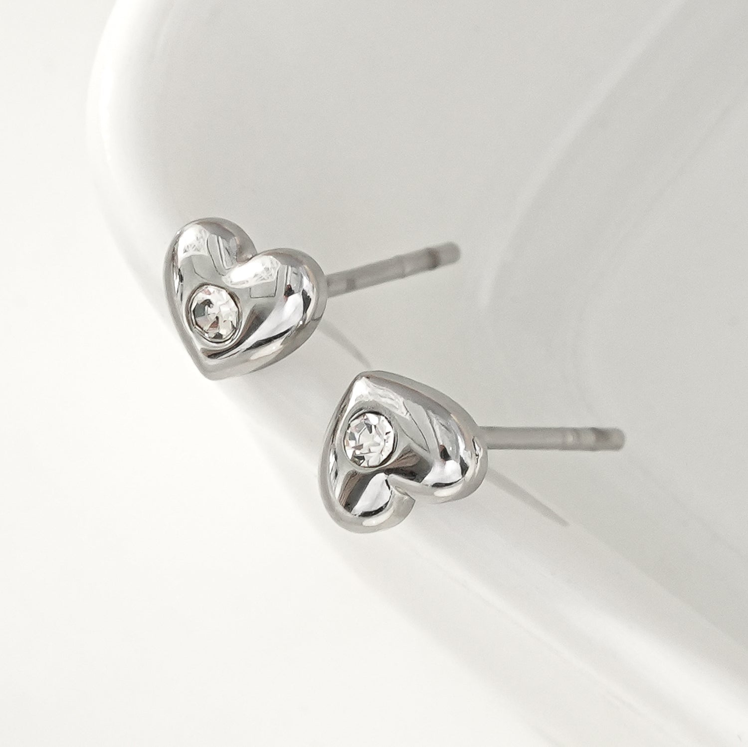 ADORE: Puffy Silver Heart Shaped Solitaire Zirconia Stud Earrings