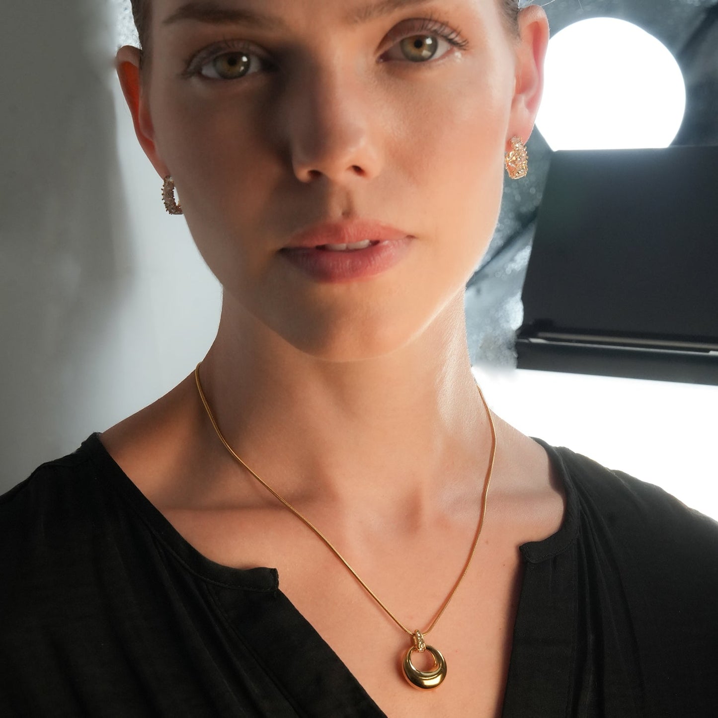 ALBASIMI: Snake Skin Chain with Zirconia (CZ) Embedded Clasp & Asymmetrical Circle Pendent.