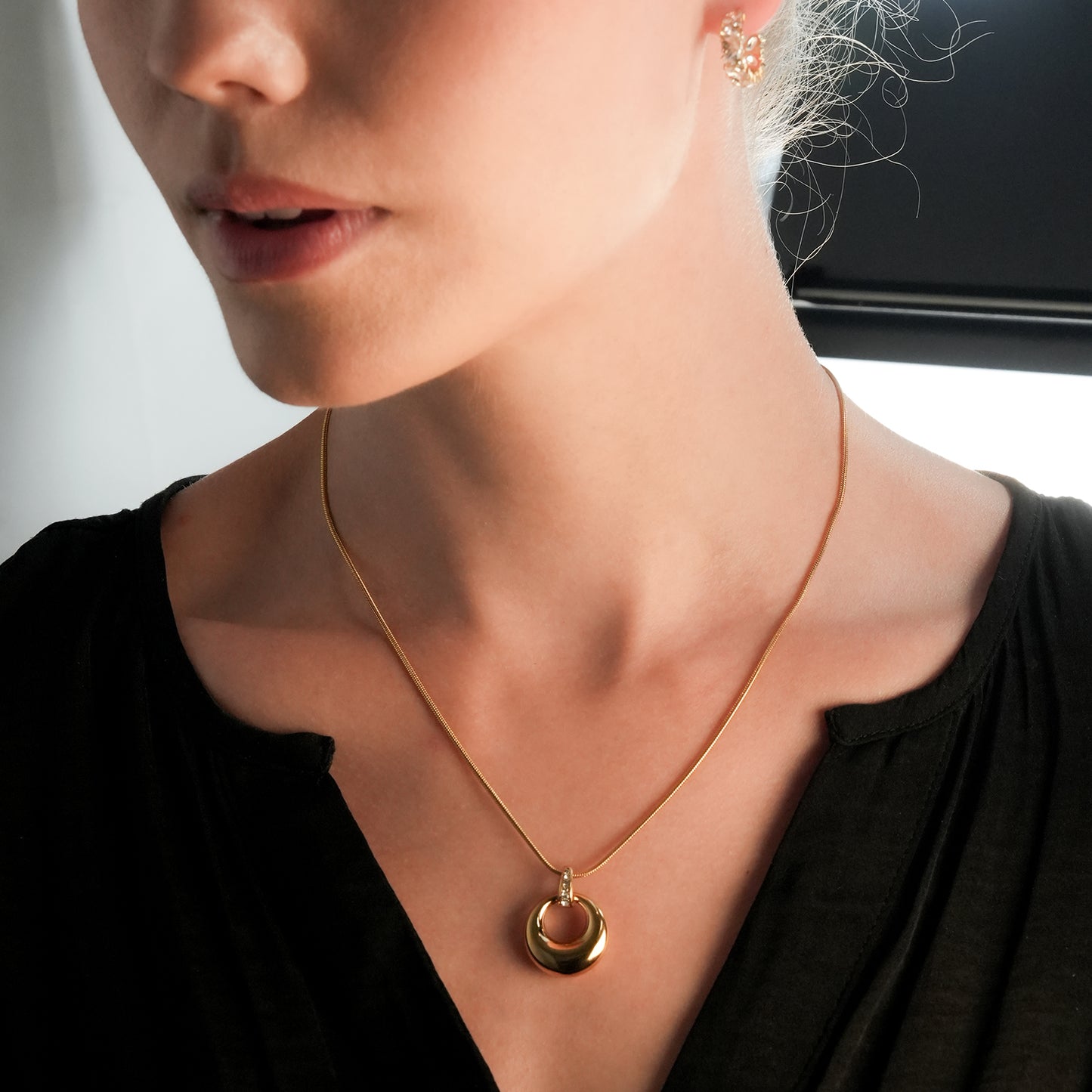 ALBASIMI: Snake Skin Chain with Zirconia (CZ) Embedded Clasp & Asymmetrical Circle Pendent.
