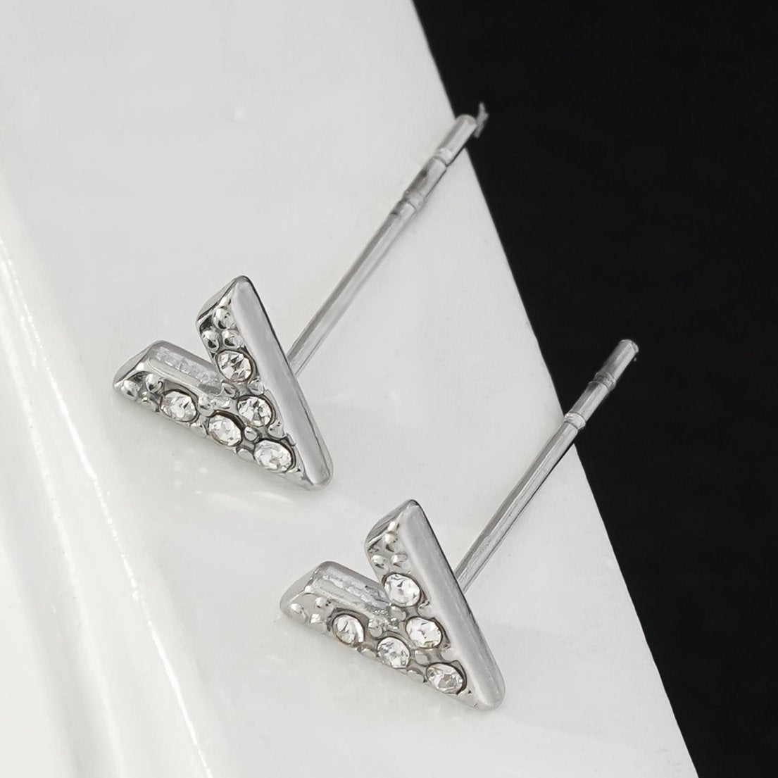 ALIVALDA Silver: 'V' Shaped Zirconia (CZ) Mini Stud Earrings