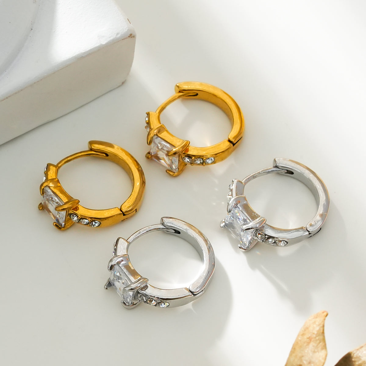 Style ASTORIA 18K Gold & White Gold (Silver Toned): Mini Hoop Gold Earrings Embedded with Zirconia Gemstones