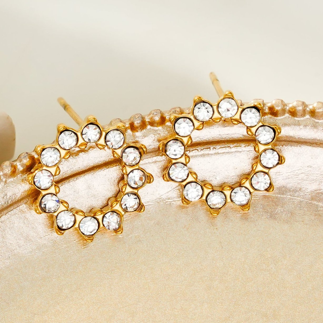 BATTISTE Gold: Celestial Star Zirconia (CZ) Stud Earrings.