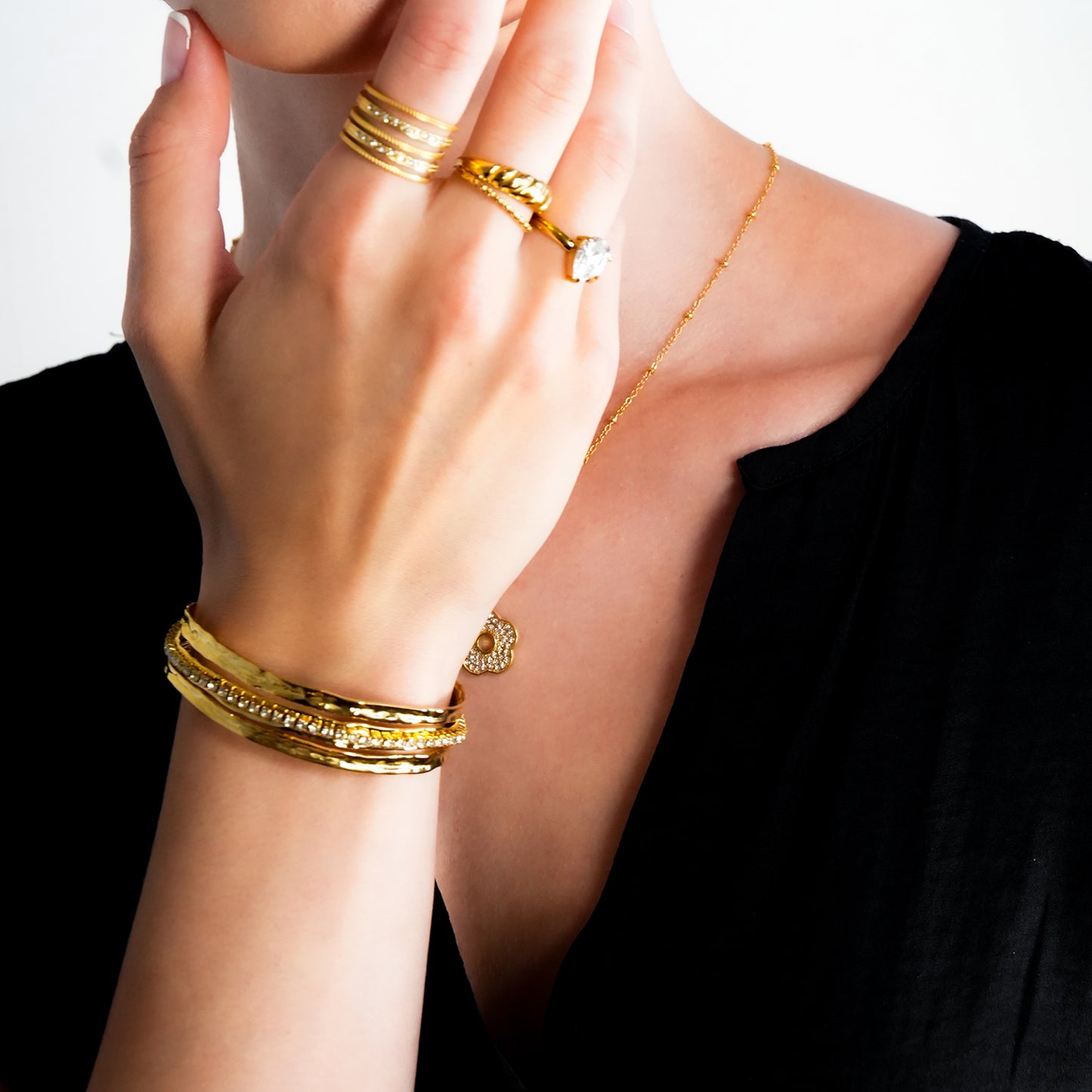 BELLINA Gold: Triple Stacked Textured Bracelet Zirconia (CZ) Embedded Tennis Bracelet at Centre. Stacked for Glamour.