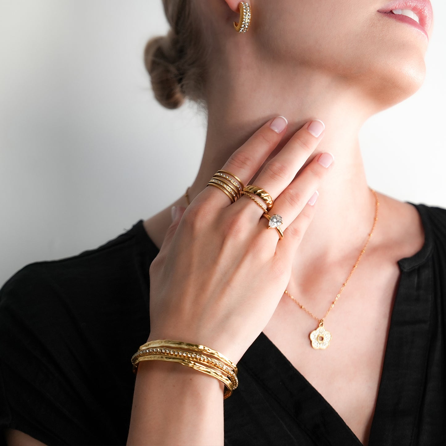 BELLINA Gold: Triple Stacked Textured Bracelet Zirconia (CZ) Embedded Tennis Bracelet at Centre. Stacked for Glamour.