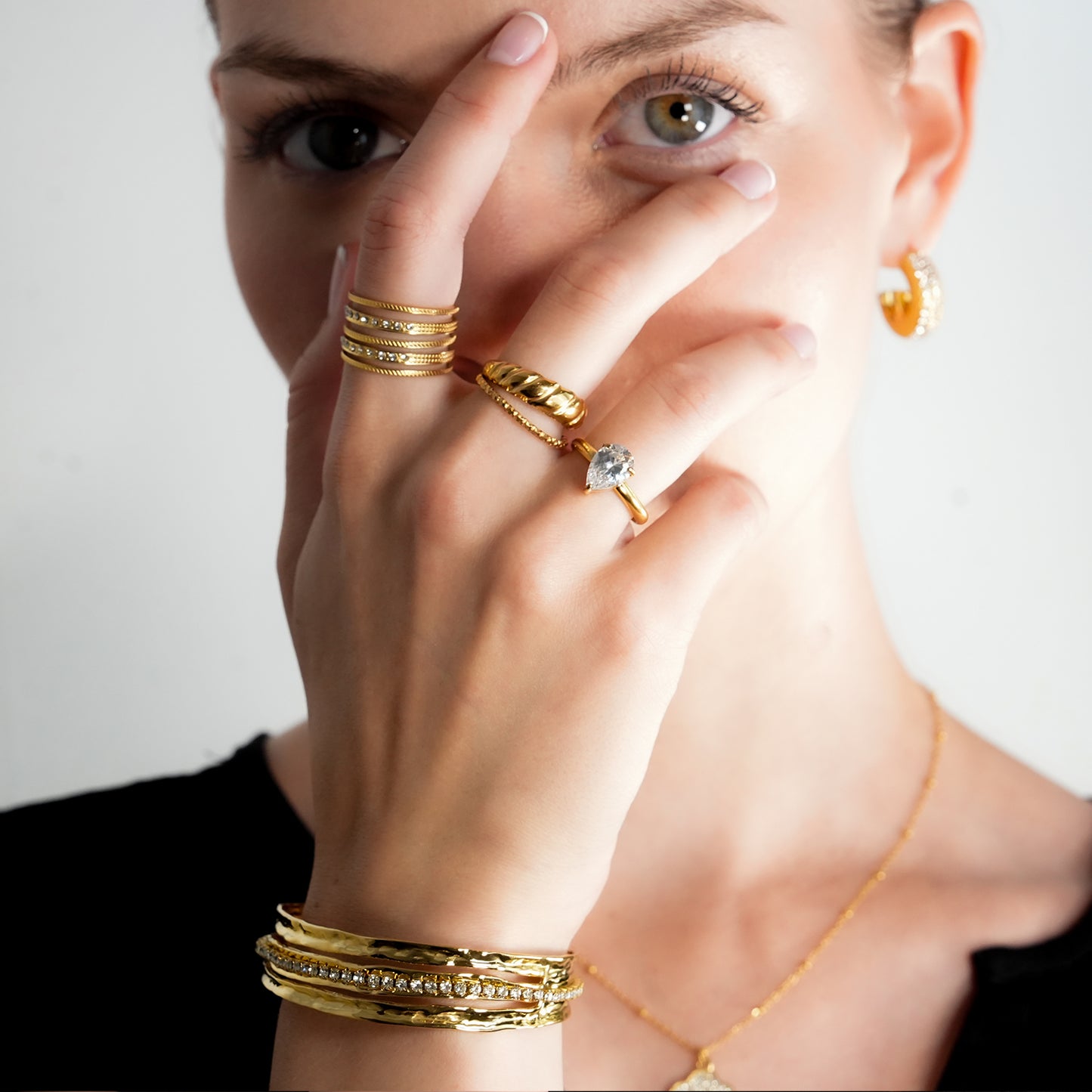BELLINA Gold: Triple Stacked Textured Bracelet Zirconia (CZ) Embedded Tennis Bracelet at Centre. Stacked for Glamour.