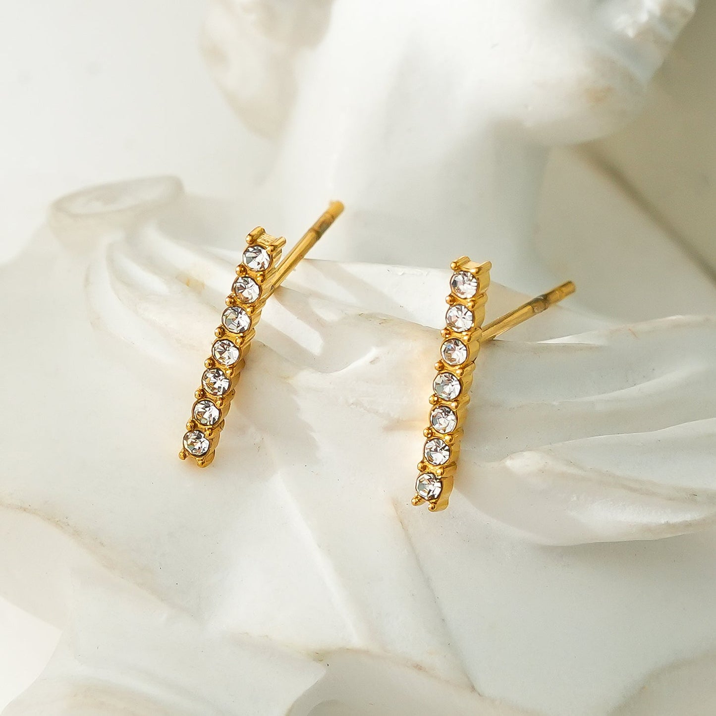 BIHAR: Minimalist Pavé Zirconia Embedded Bar Stud Earrings in Gold.