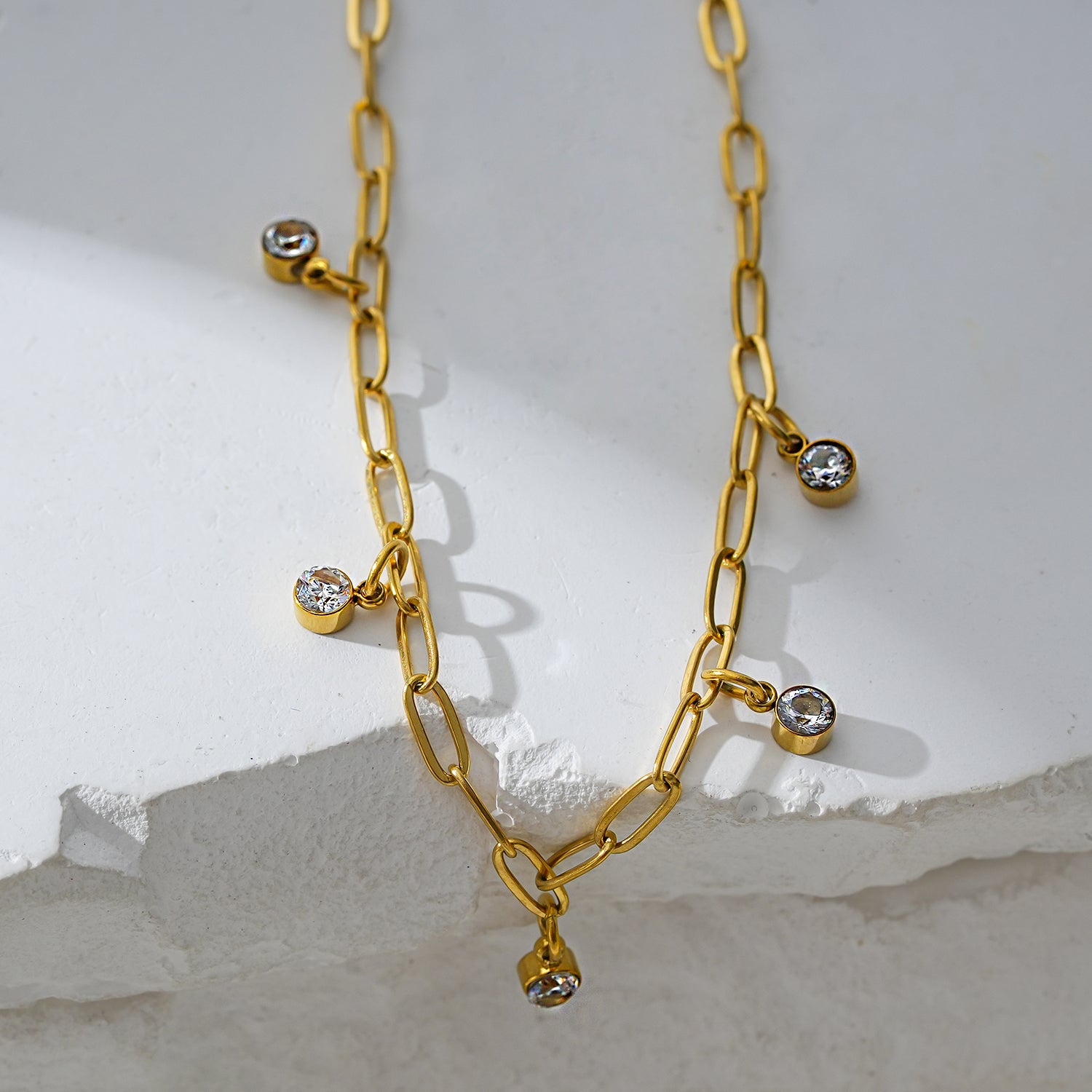 Style CANARI 2083: Mini Paper-Clip Chain Anklet with Satellite Zirconia Charms.