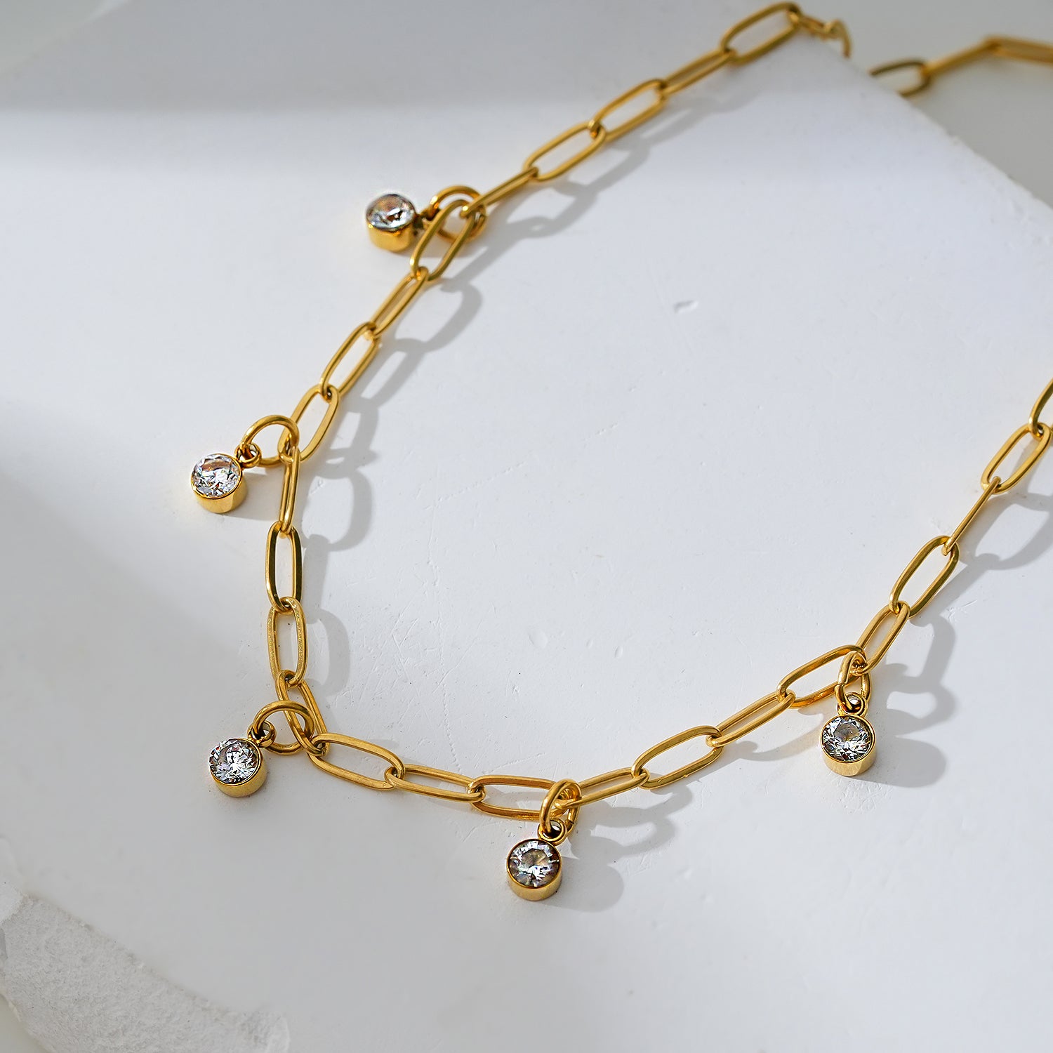 Style CANARI 2083: Mini Paper-Clip Chain Anklet with Satellite Zirconia Charms.