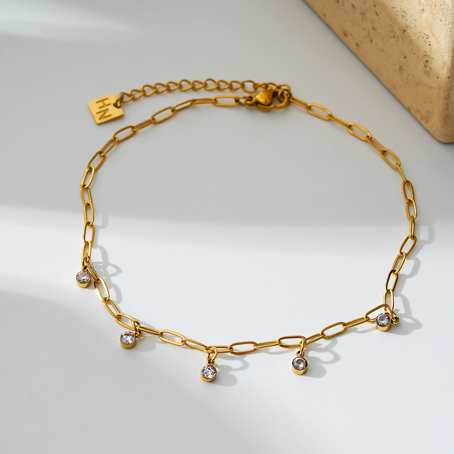 Style CANARI 2083: Mini Paper-Clip Chain Anklet with Satellite Zirconia Charms.