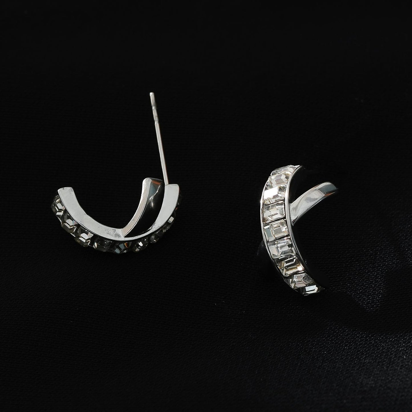 CARBIS: Retro Style Crossover Zirconia Embedded Earrings in White Gold (Silver Toned)