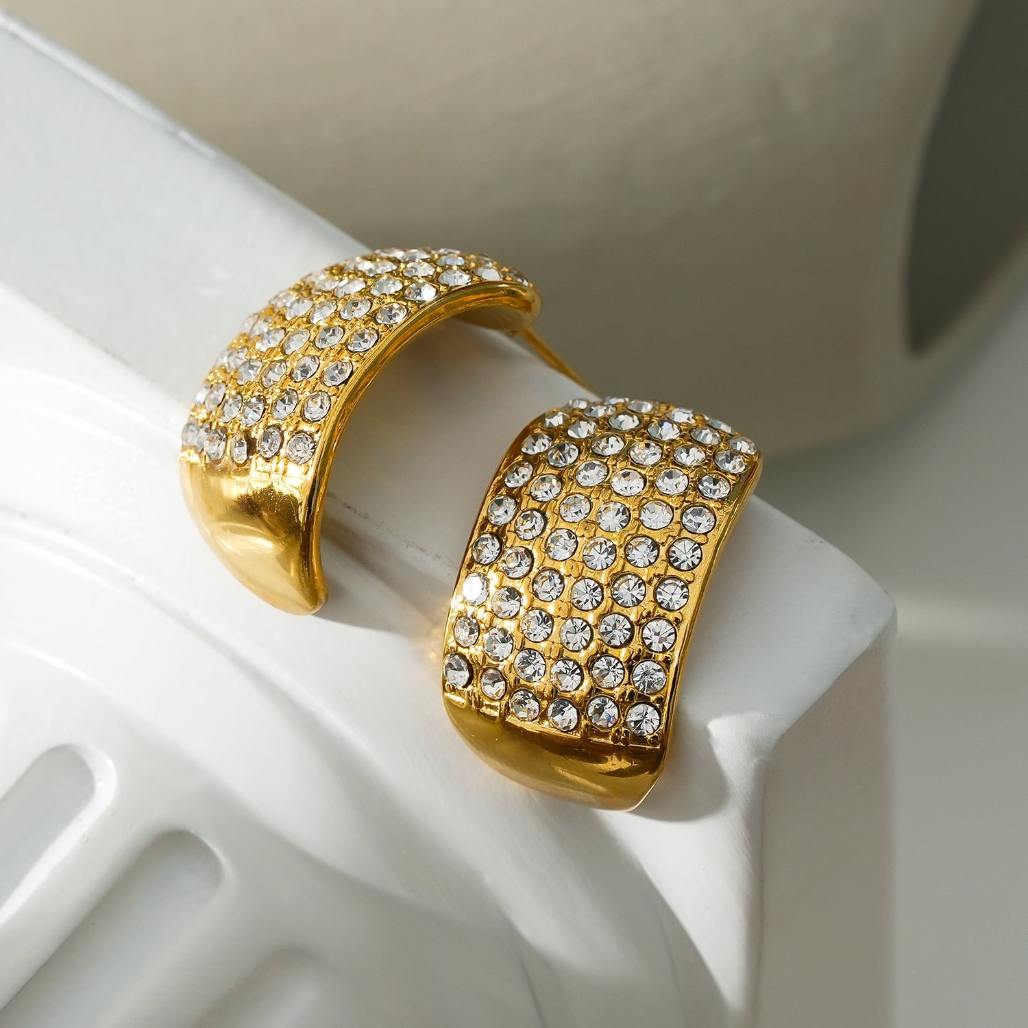 Style CARMEL: Curved Pavé Zirconia Stud Earrings in Gold