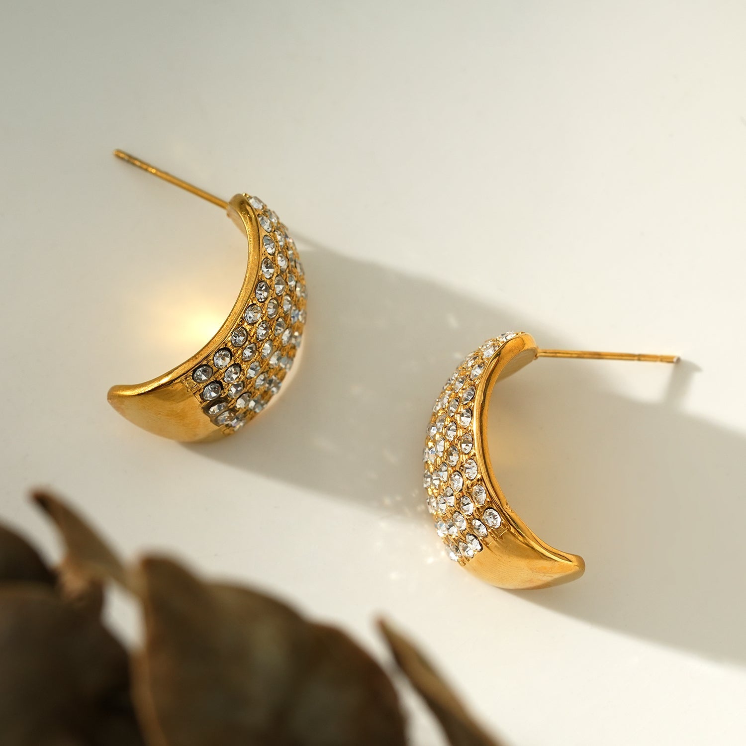 Style CARMEL: Curved Pavé Zirconia Stud Earrings in Gold