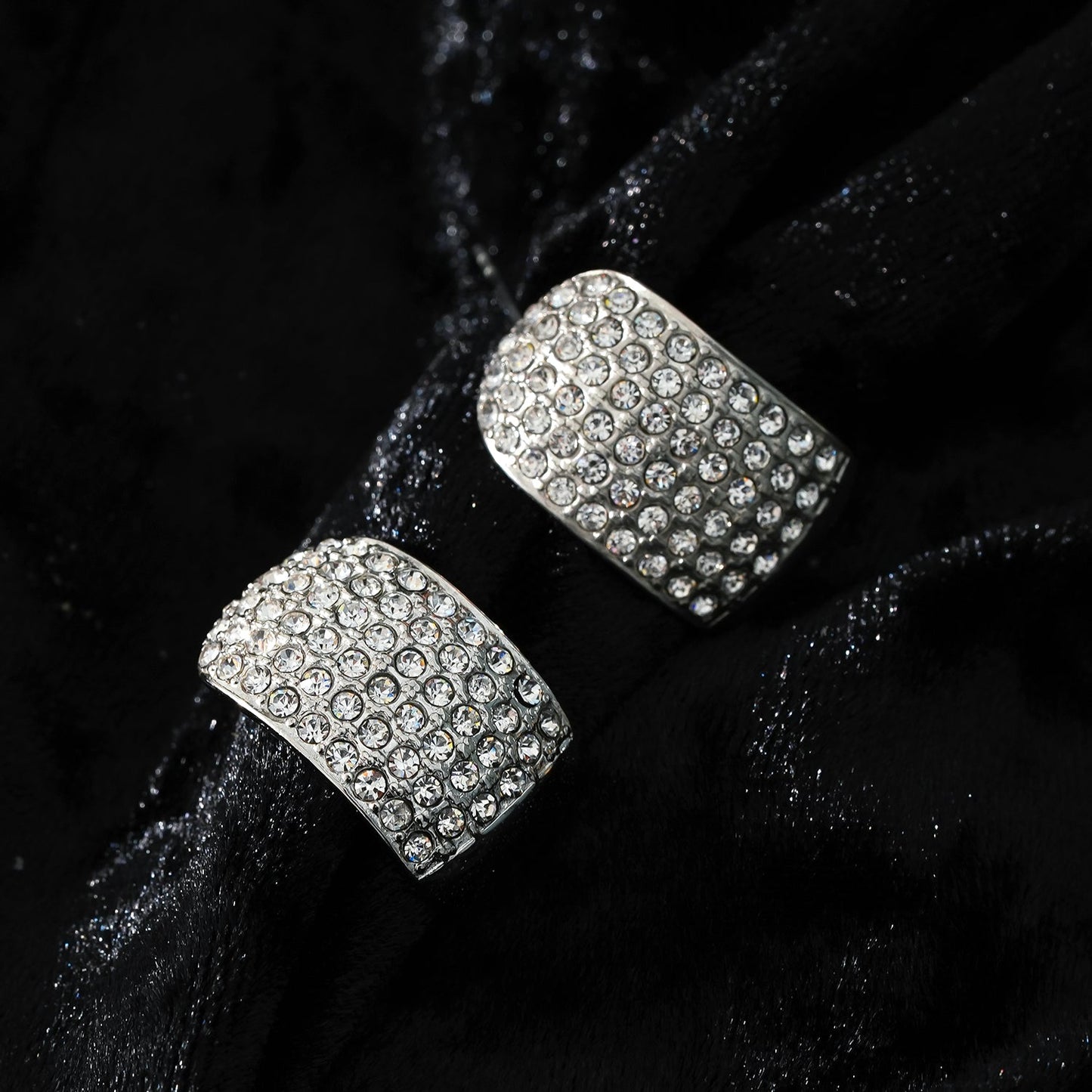 Style CARMEL: Curved Pavé Zirconia Stud Earrings in White Gold (Silver Toned)