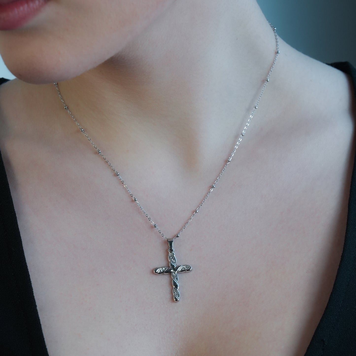 CHAMONIX Silver Toned White Gold: Dainty Beaded Chain Necklace with a Zirconia Embedded Textured Cross Pendent