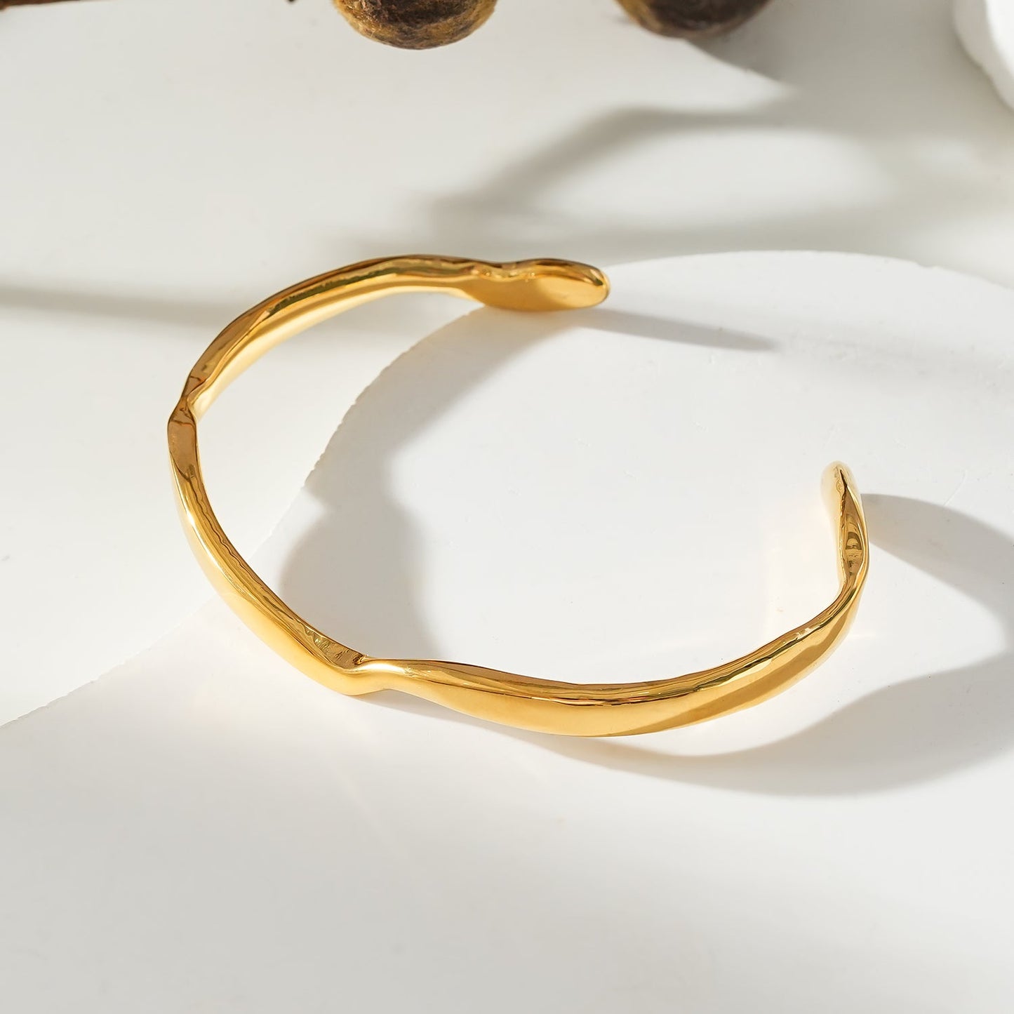 Style CHANBA: Avant Garde Abstract Shaped Bracelet in Gold
