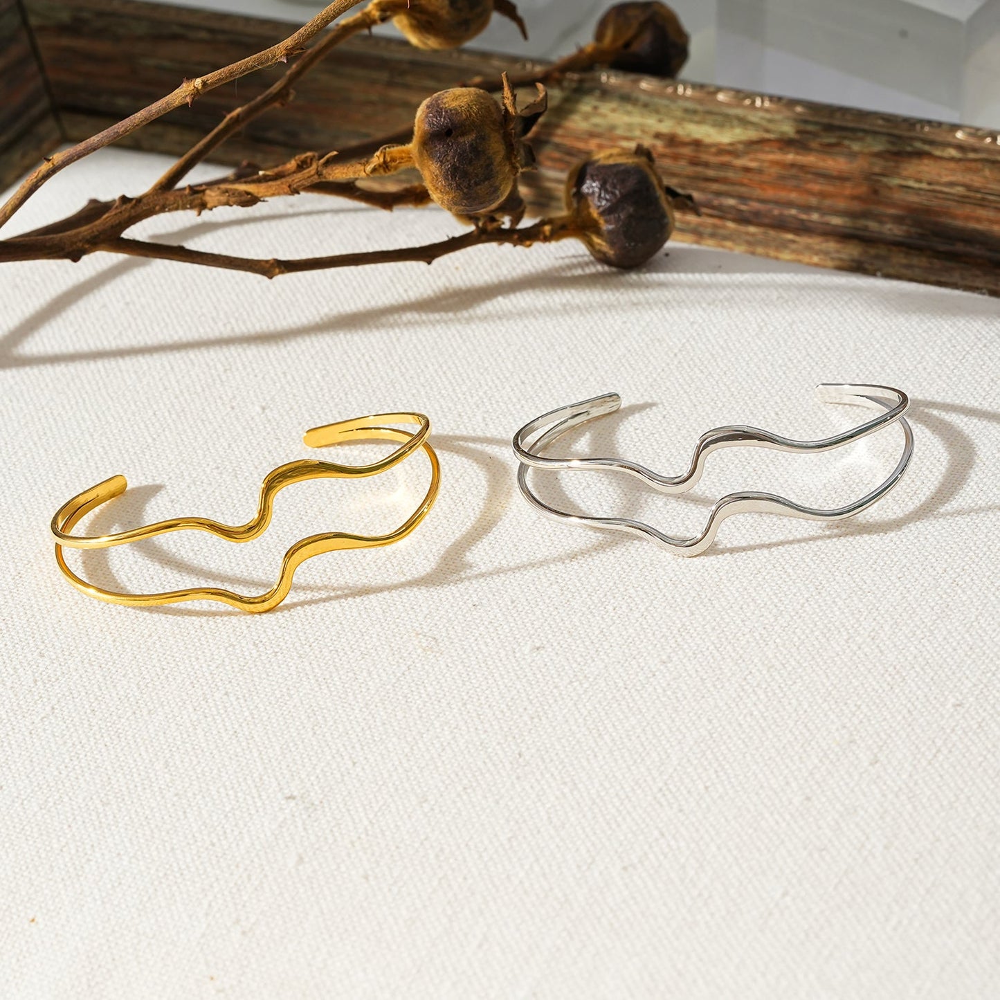 CHITRA: Industrial-Chic Bracelet with Abstract Shaped Parallel Bands in Silver Toned White Gold