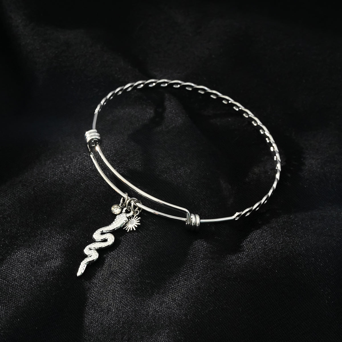 CATALINA White Gold (Silver Toned): Bracelet with Serpent, Sun Symbol and Zirconia (CZ) Charms.