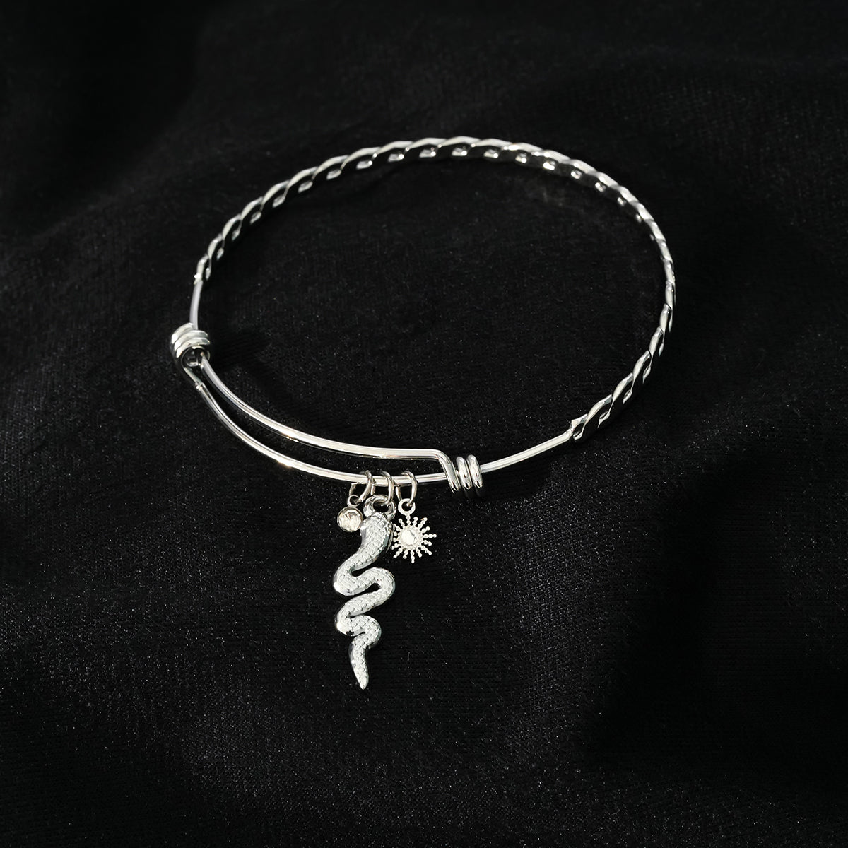 CATALINA White Gold (Silver Toned): Bracelet with Serpent, Sun Symbol and Zirconia (CZ) Charms.