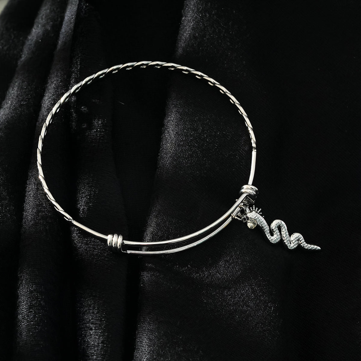 CATALINA White Gold (Silver Toned): Bracelet with Serpent, Sun Symbol and Zirconia (CZ) Charms.