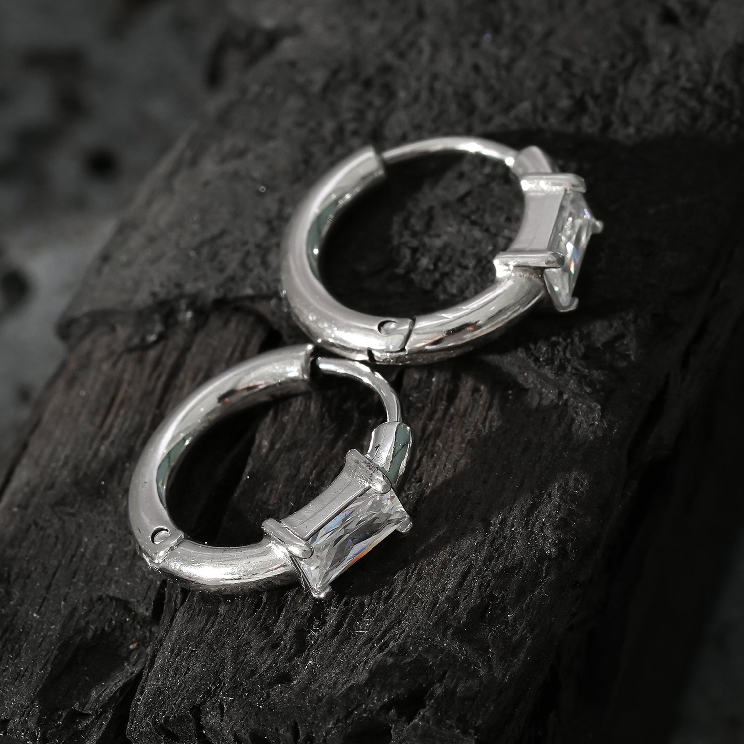 Style CONWYN: Retro Style Hoops with an Encased Clear Zirconia Charm in Silver.