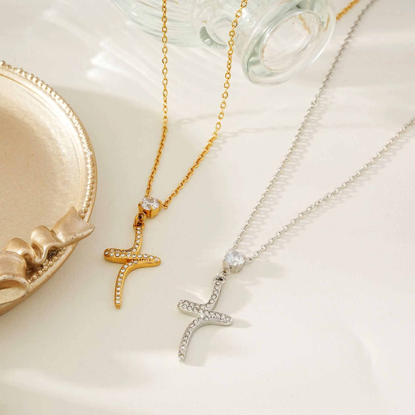 CRISTO Silver Toned White Gold: Dainty Chain Necklace with a Zirconia Embedded Abstract Textured Cross Pendent