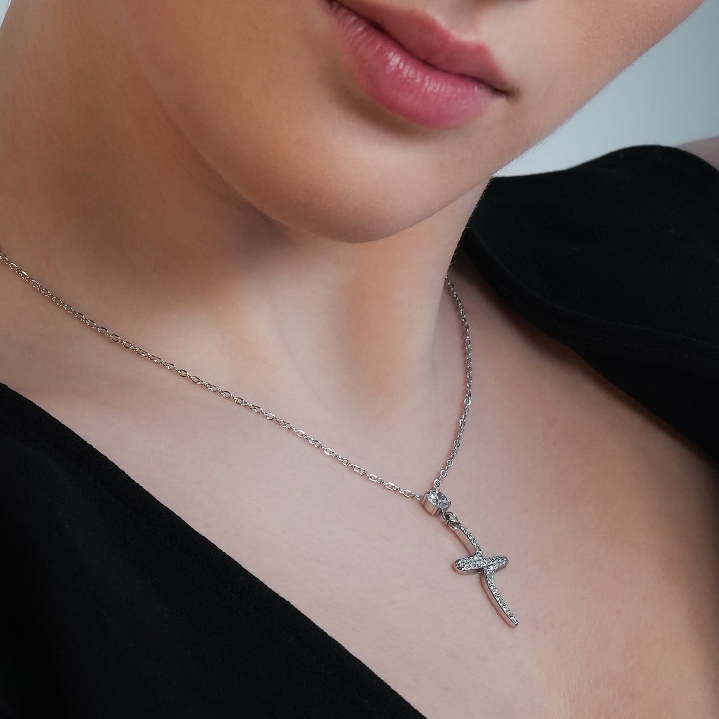 CRISTO Silver Toned White Gold: Dainty Beaded Chain Necklace with an Abstract Textured Cross Pendent