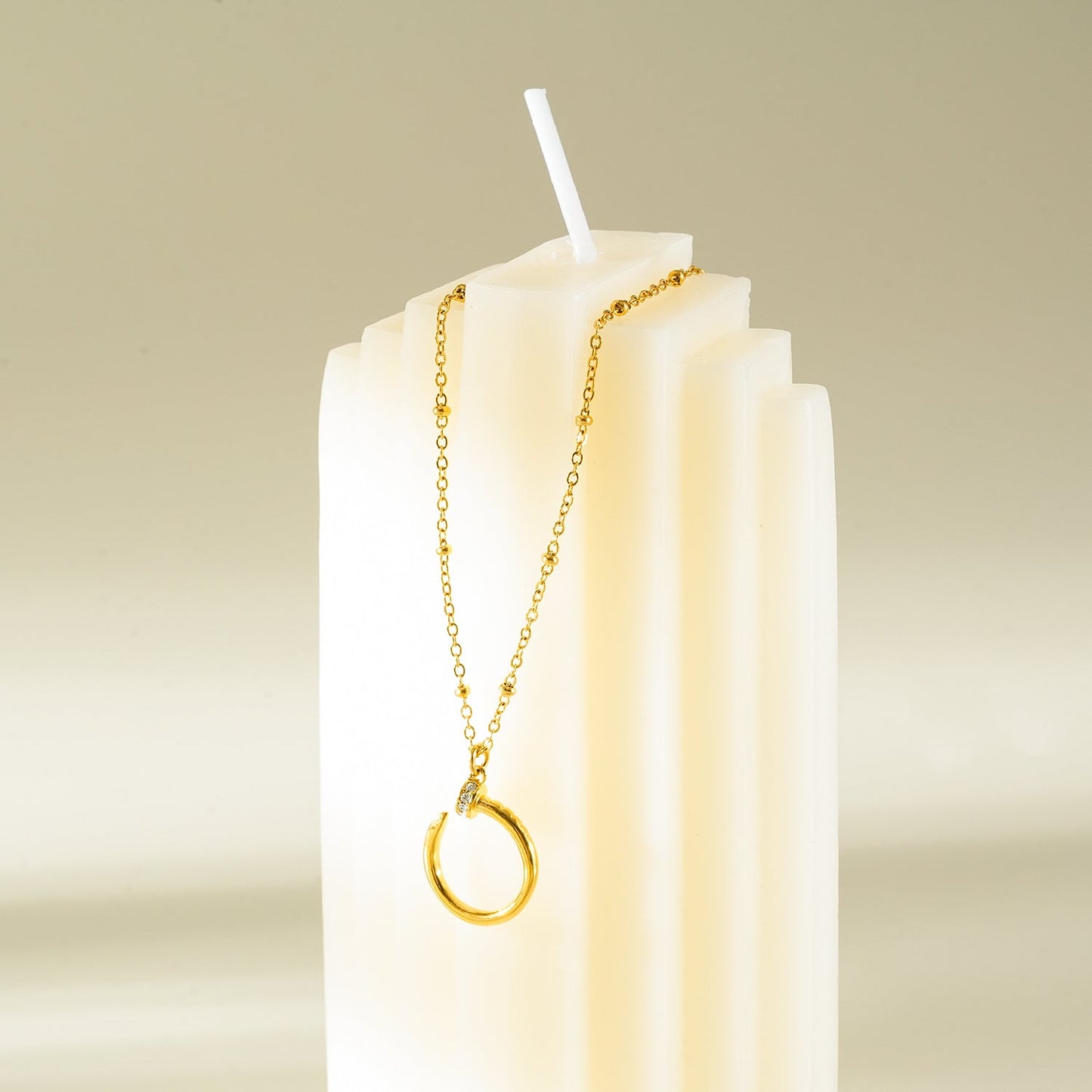CSENGE Gold Necklace:  Zirconia Embedded Circular Nail Pendant on a Satellite Beaded Chain