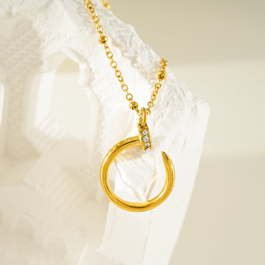 CSENGE Gold Necklace:  Zirconia Embedded Circular Nail Pendant on a Satellite Beaded Chain