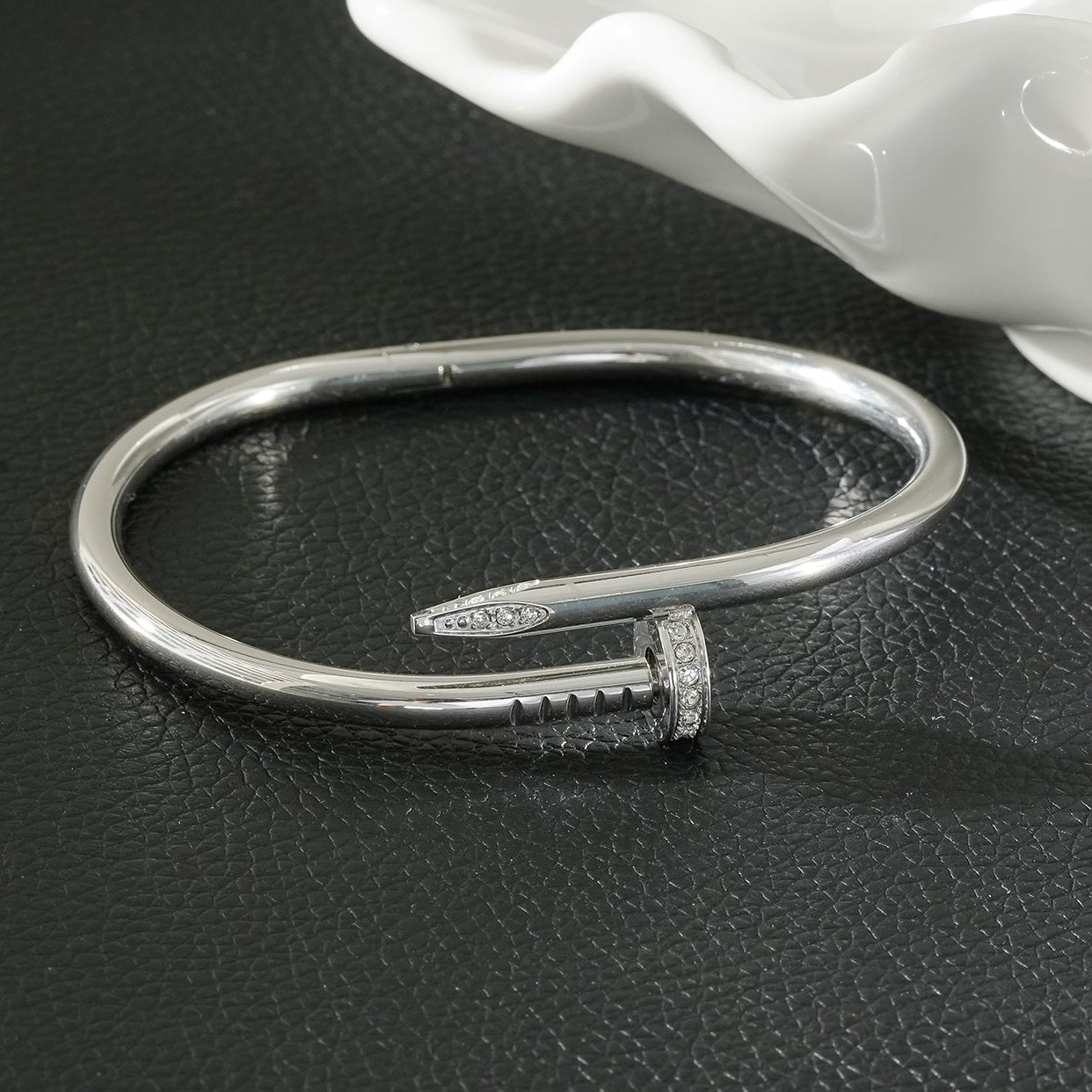 DAVIDKA Silver (White Gold): Zirconia Embedded Industrial-Chic Twisted Nail Bracelet