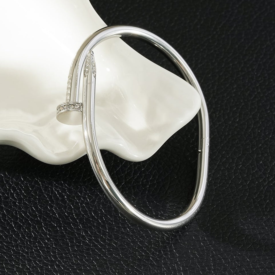 DAVIDKA Silver (White Gold): Zirconia Embedded Industrial-Chic Twisted Nail Bracelet