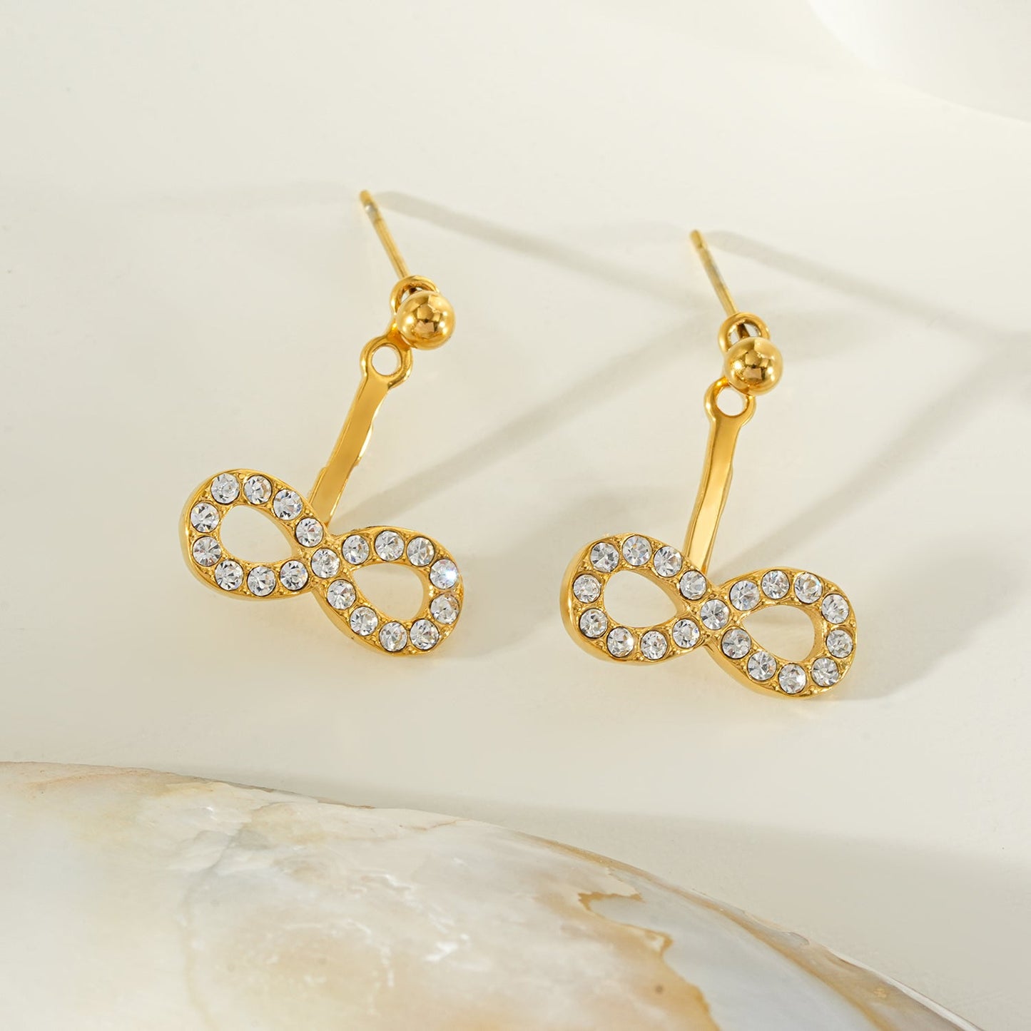 CILMILLE Gold: Mini Ball-Bead Stud Earrings Anchoring a Zirconia Infinity Charm