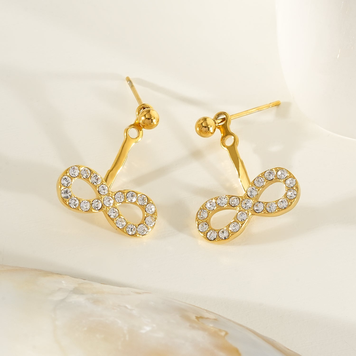 CILMILLE Gold: Mini Ball-Bead Stud Earrings Anchoring a Zirconia Infinity Charm