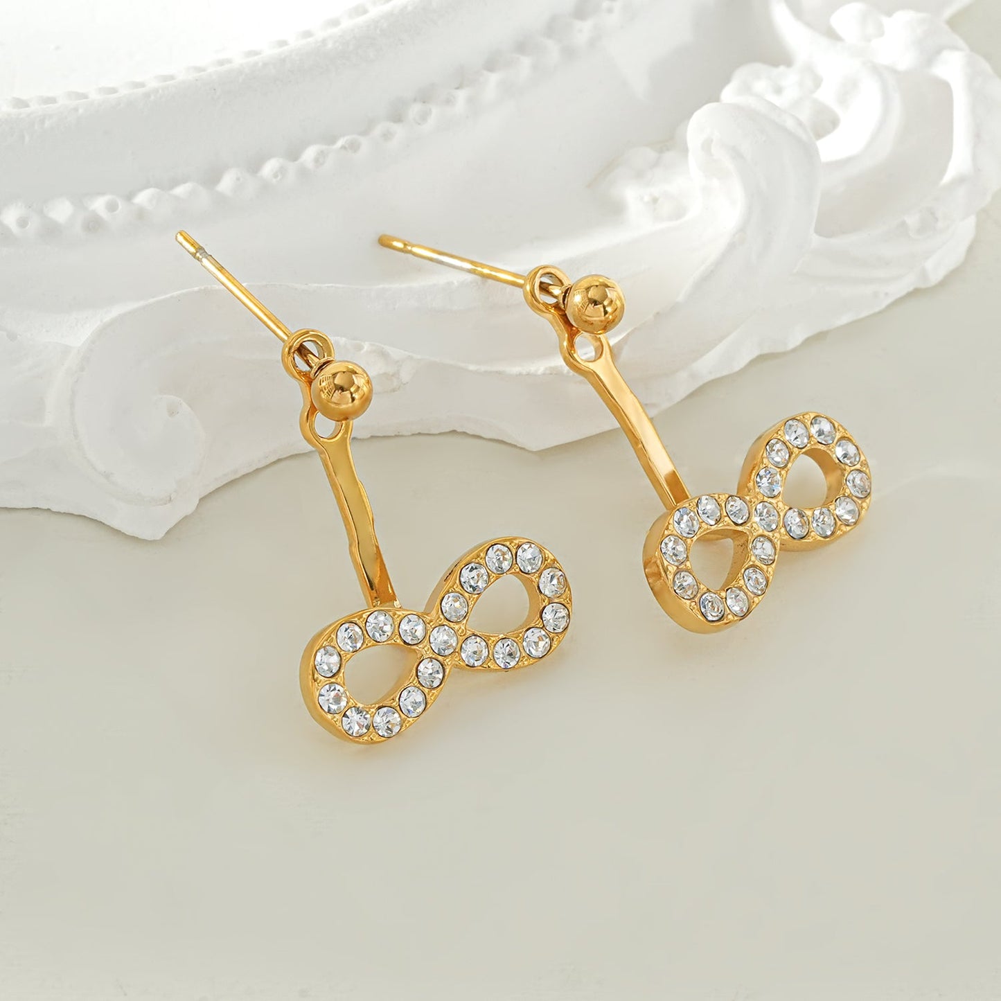 CILMILLE Gold: Mini Ball-Bead Stud Earrings Anchoring a Zirconia Infinity Charm