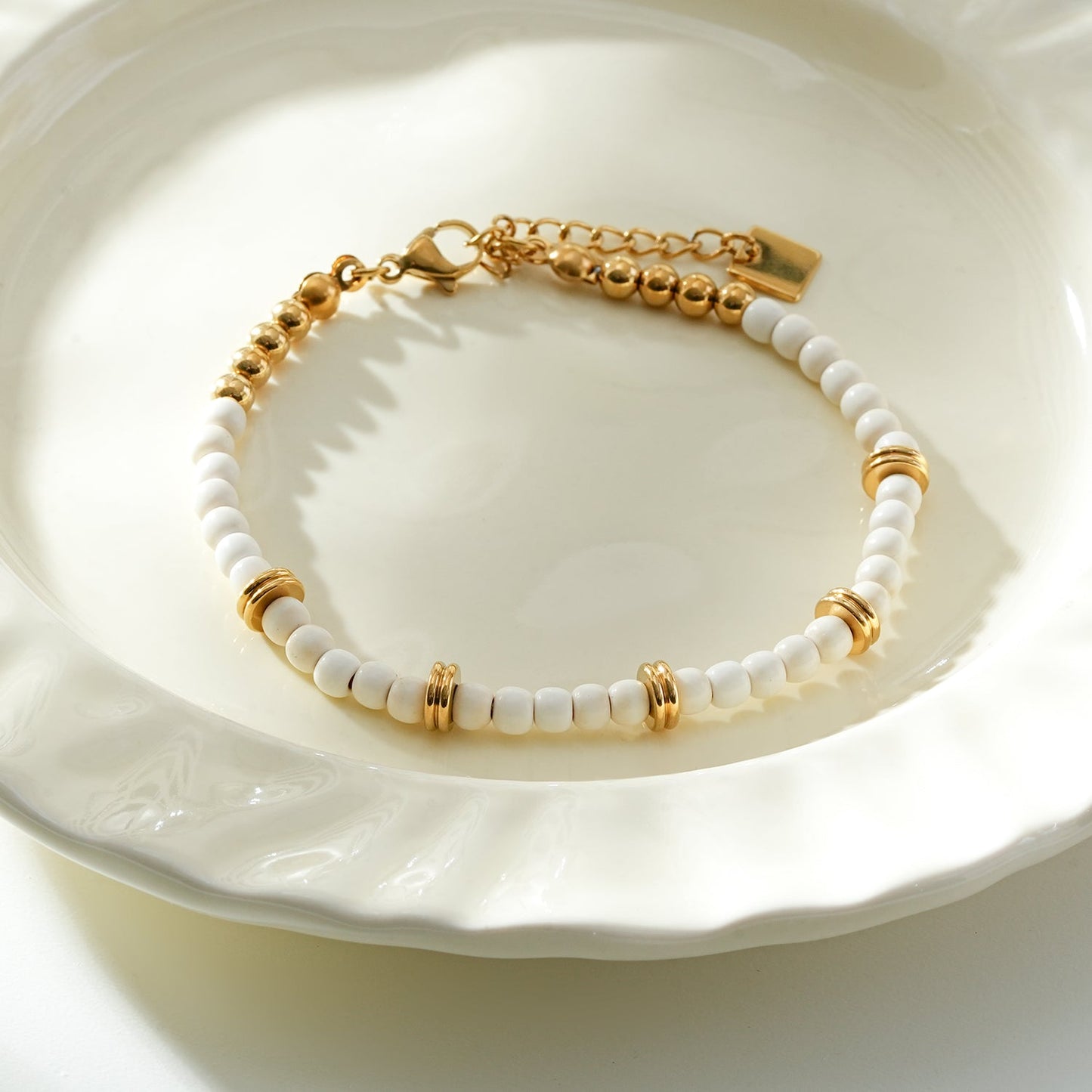 JAMILAH Gold: White Turquoise Stones and Gold Beaded Bracelet.